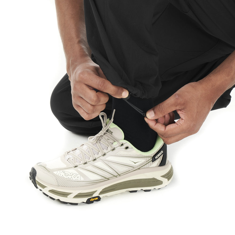 Adjustable drawcord hem