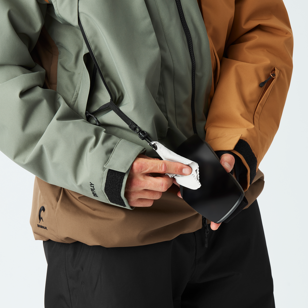 Goggle cleaner inside the chest pocket