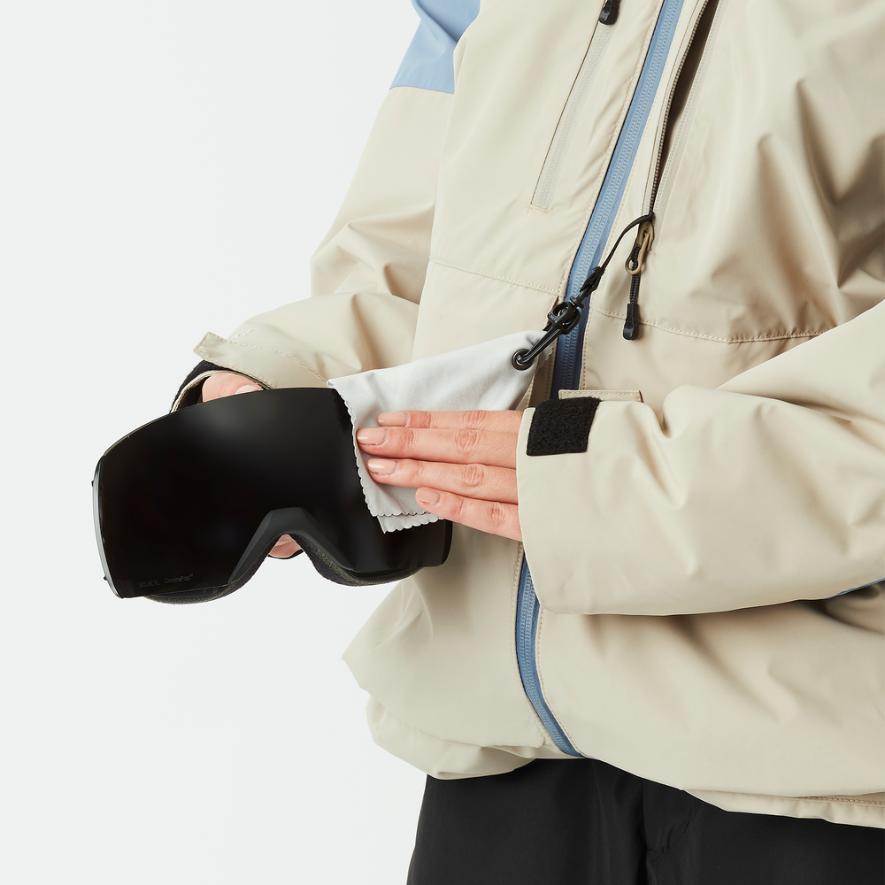 Goggle cleaner inside the chest pocket