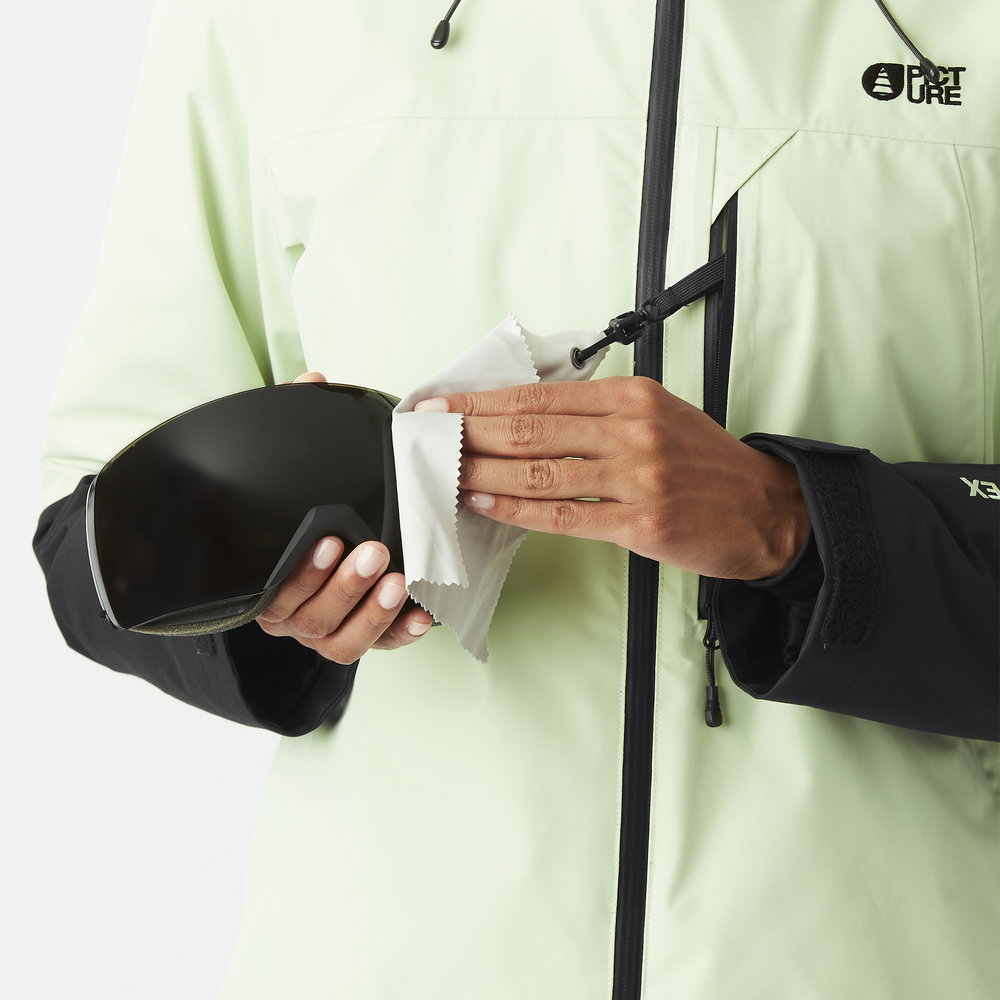 Goggle cleaner inside the chest pocket