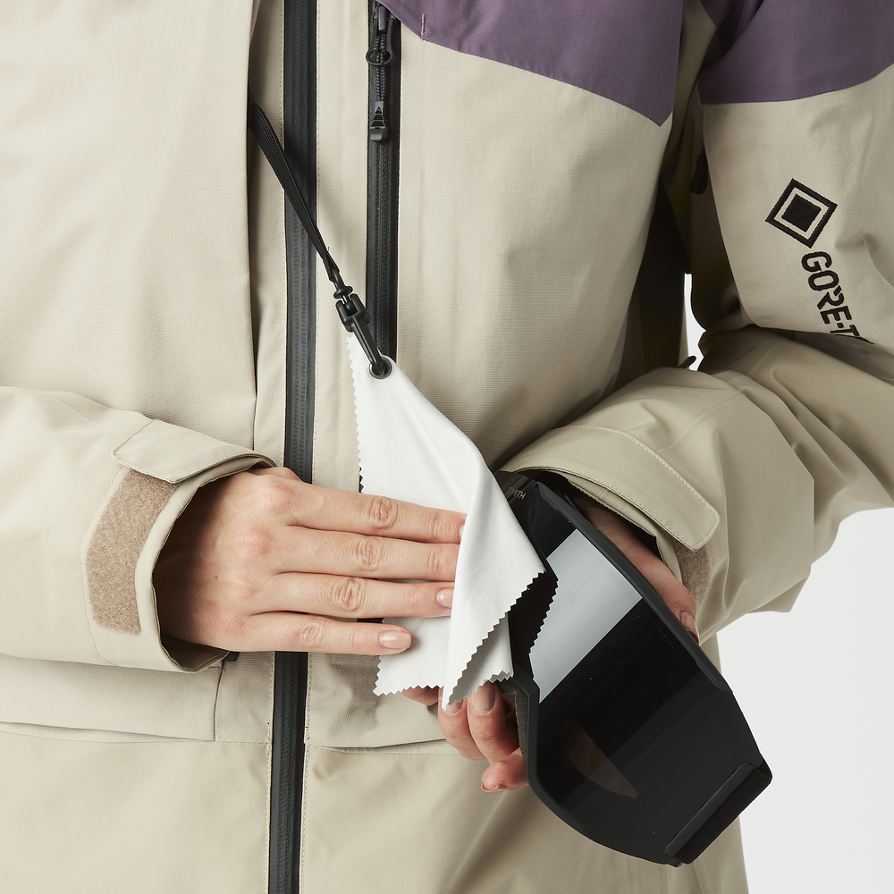 Goggle cleaner inside the chest pocket